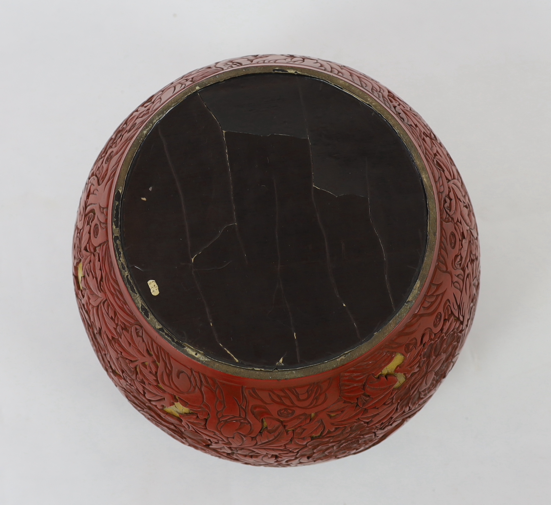 A large Chinese cinnabar lacquer ‘pheasant and peony’ jardiniere, 19th century, losses and numerous loose sections